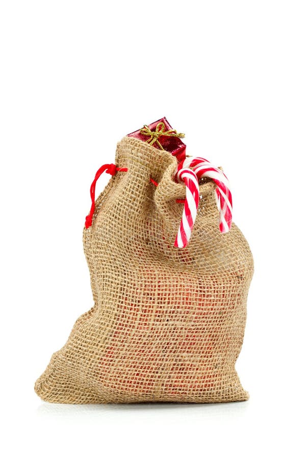 Obrázok z vrecovina taška plný z darčeky cukríky biely.