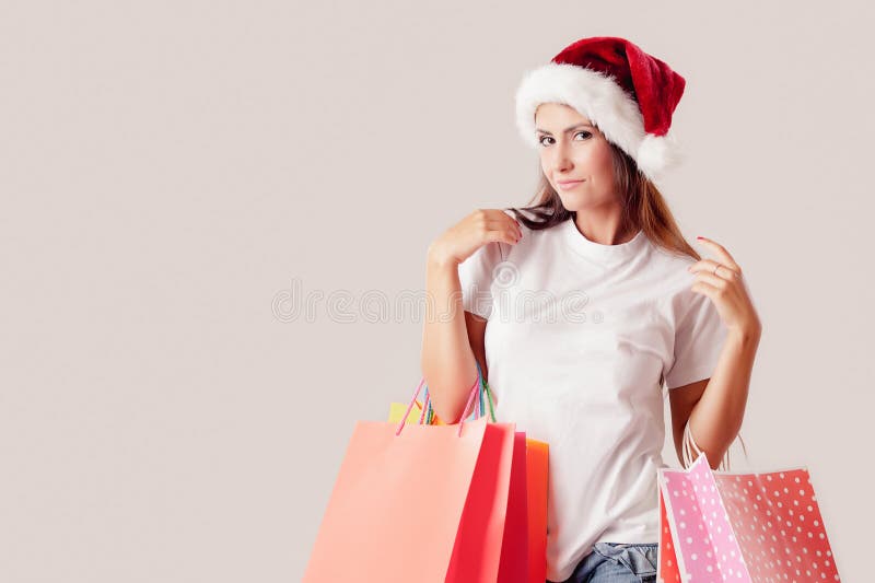 Christmas shopping woman with shopping bags  on white stock photos