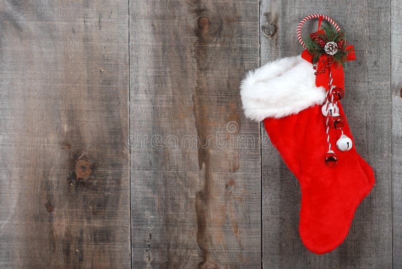 Christmas sock and wreath on wood