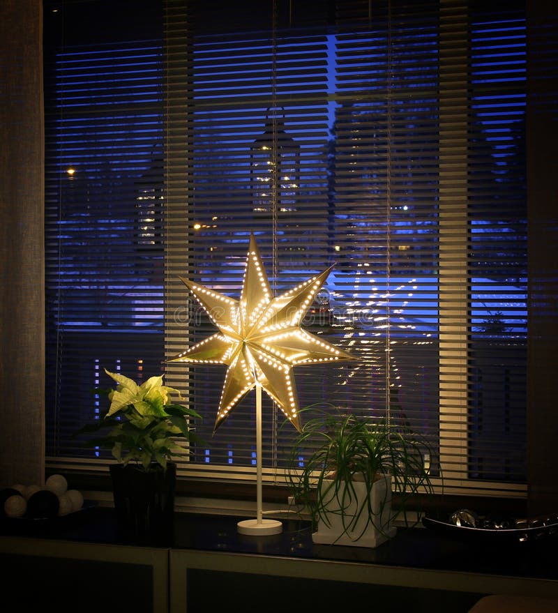Christmas star decor by window