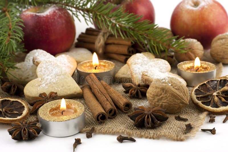 Christmas still life with cookies, candle and spices