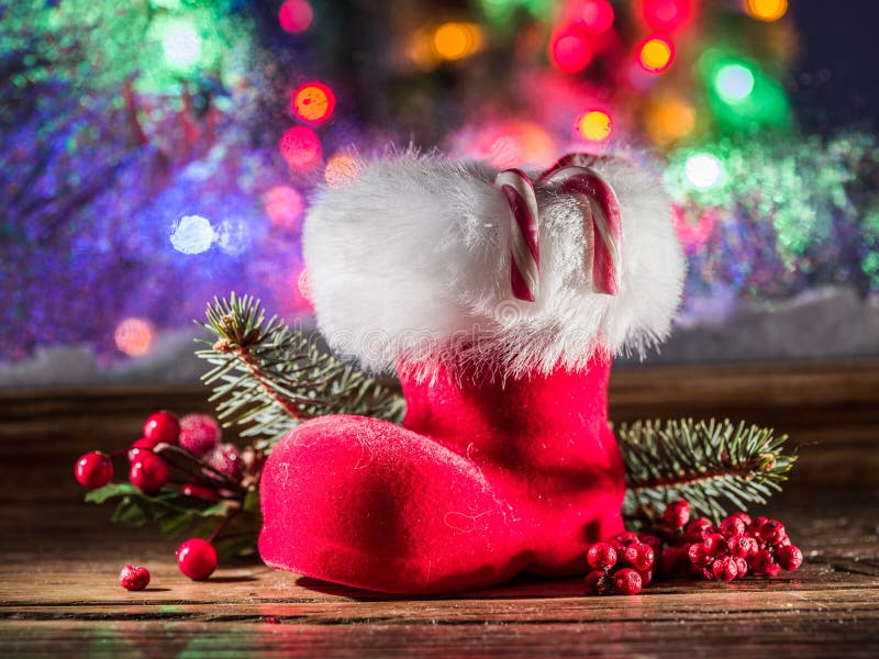 Christmas stocking and candy canes. Christmas symbols.