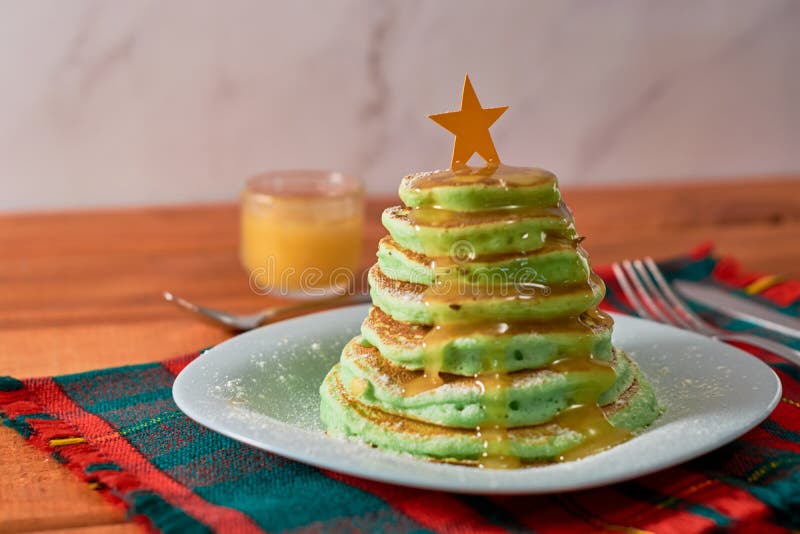 Christmas Themed Breakfast. Pancakes Decorated in the Shape of a Christmas Tree Stock Photo