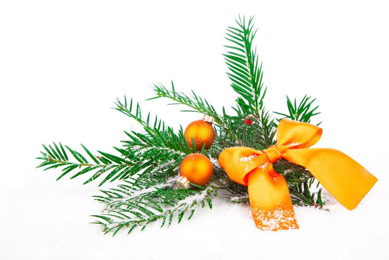 Christmas tree and ball on snow