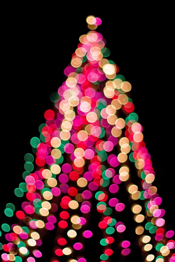 Out of focus Christmas tree with colorful lights. Out of focus Christmas tree with colorful lights