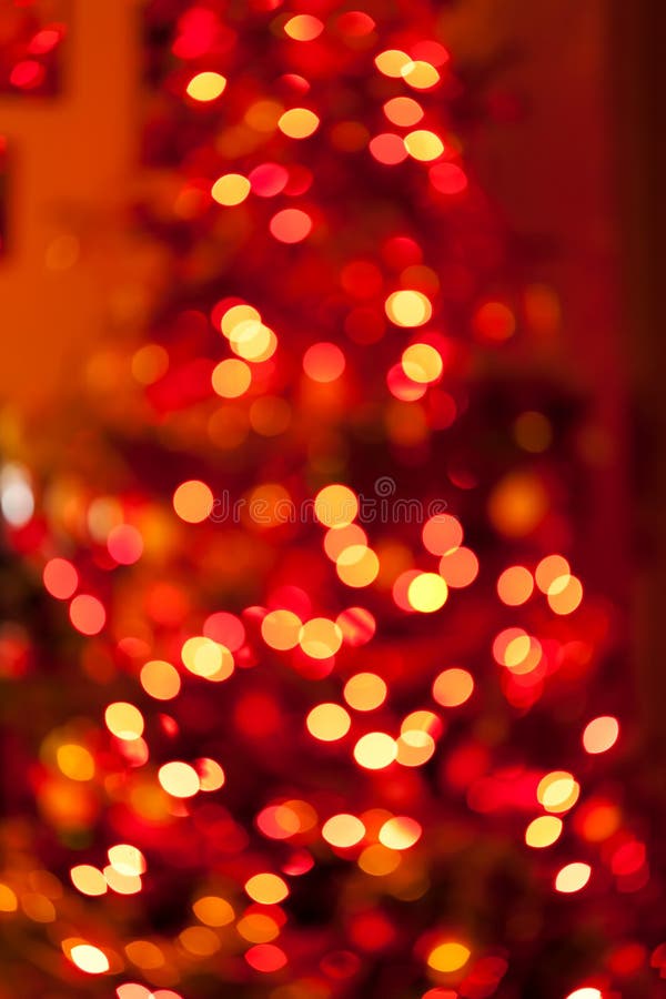 Christmas tree bokeh background. Glitter and light abstract.