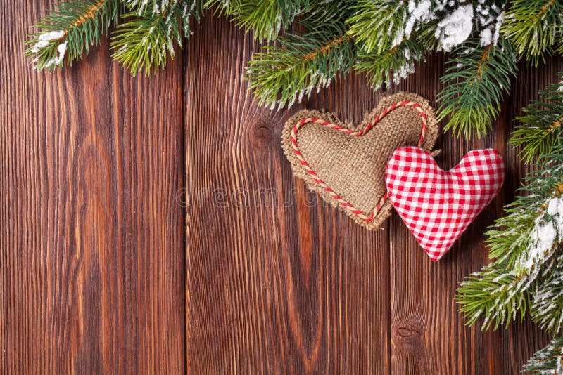 Christmas tree branch with heart toys