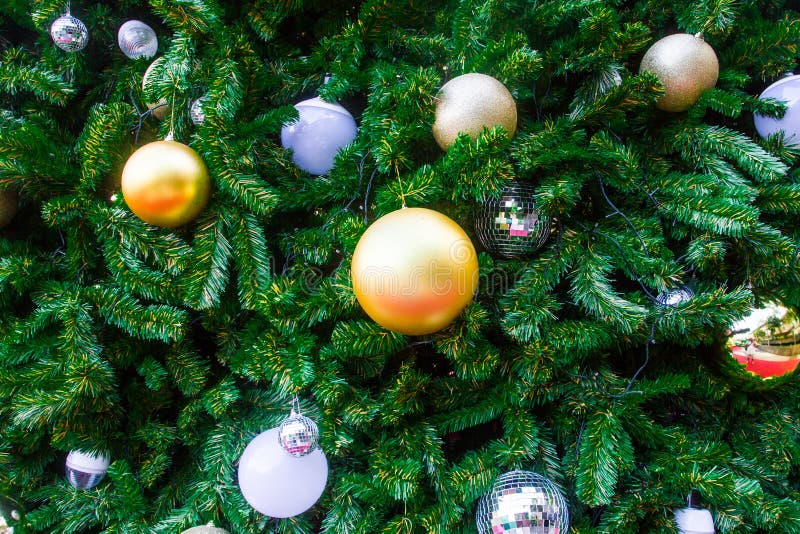 Christmas Tree Decorated with Gold and Light, Gold Balls, Mirror Balls