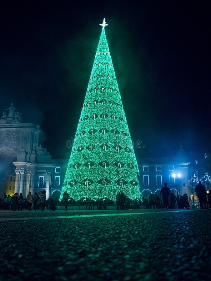 Christmas Tree Decorated with Lights during the Night in Commerce