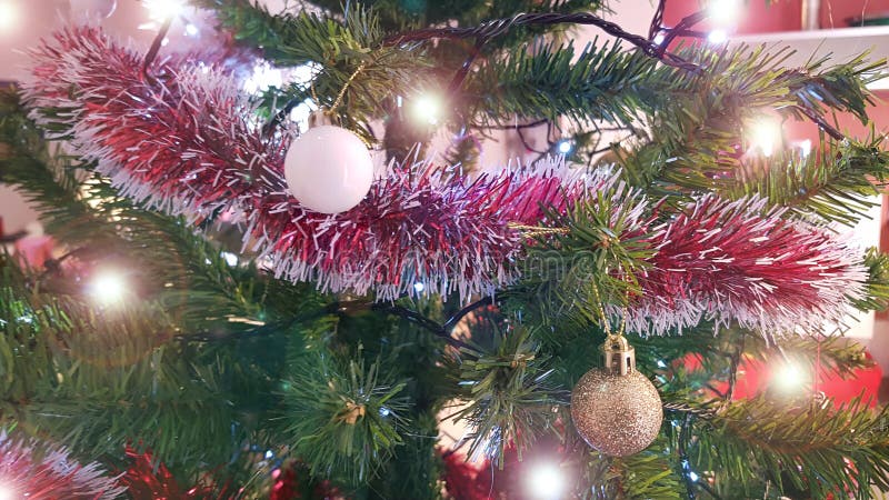 Christmas Tree with Decoration. Close Up with Shiny Balls Hanging on ...
