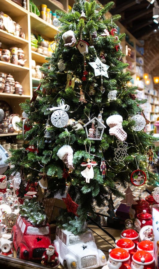 Christmas Tree and Decorations in a Store Window in Lviv, Ukraine. Blur