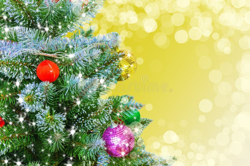 Christmas Tree on Gold Background. Lights Sparkle on New Year Tree