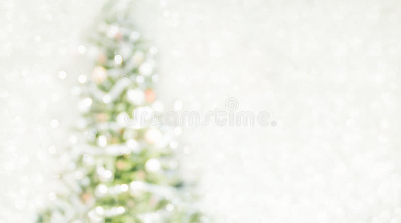 Christmas tree with light string and ball decoration at abstract