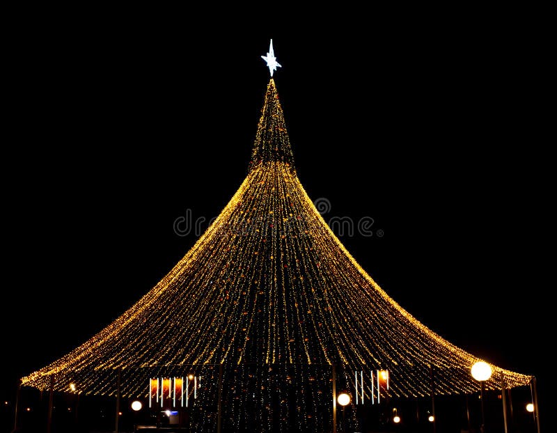 The Christmas Tree Lights Up in Garlands Stock Image Image of bright