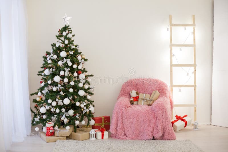 Christmas Tree with Presents in Christmas Lights Room Gifts Stock Photo
