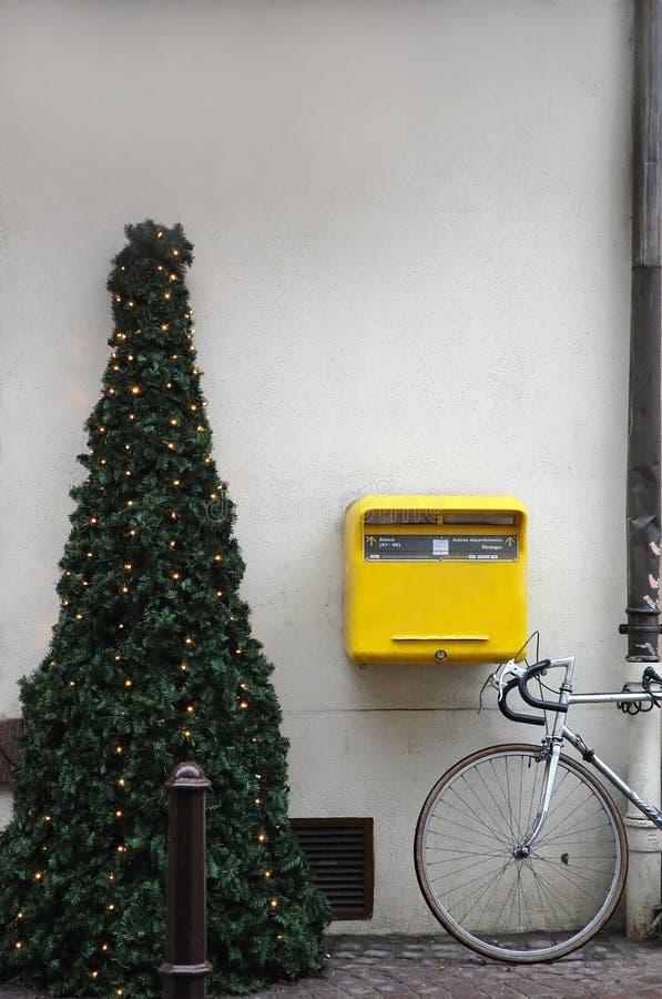 Christmas tree on sidewalk