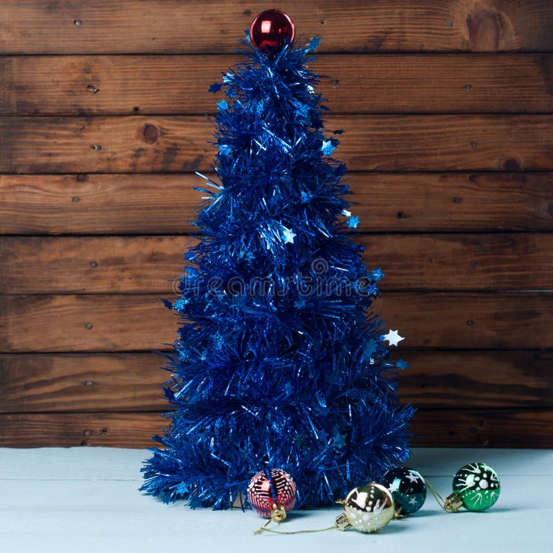 Christmas Tree with Their Hands, Blue Tinsel, Stock Image Image of