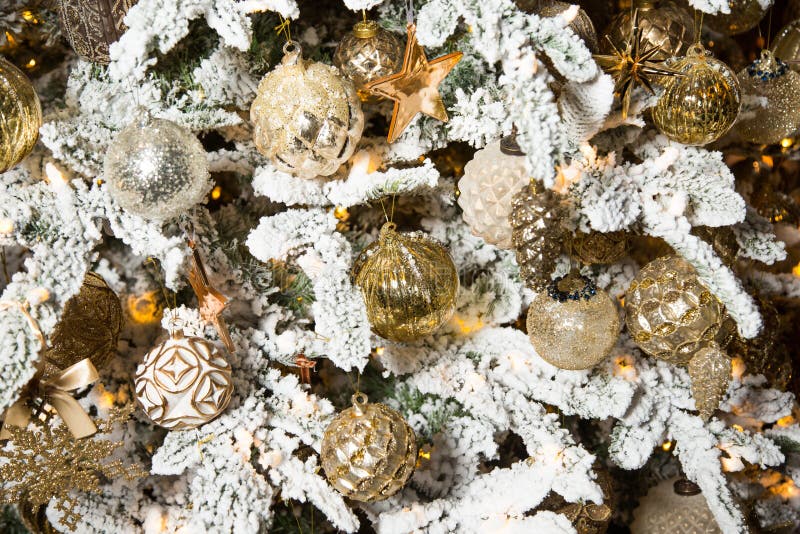 Christmas Tree with White Branches and Golden Christmas Decorations