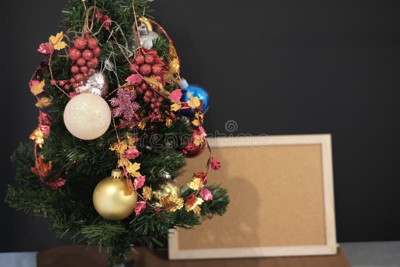 Christmas Tree and Golden Wood Frame on White Background Stock Photo