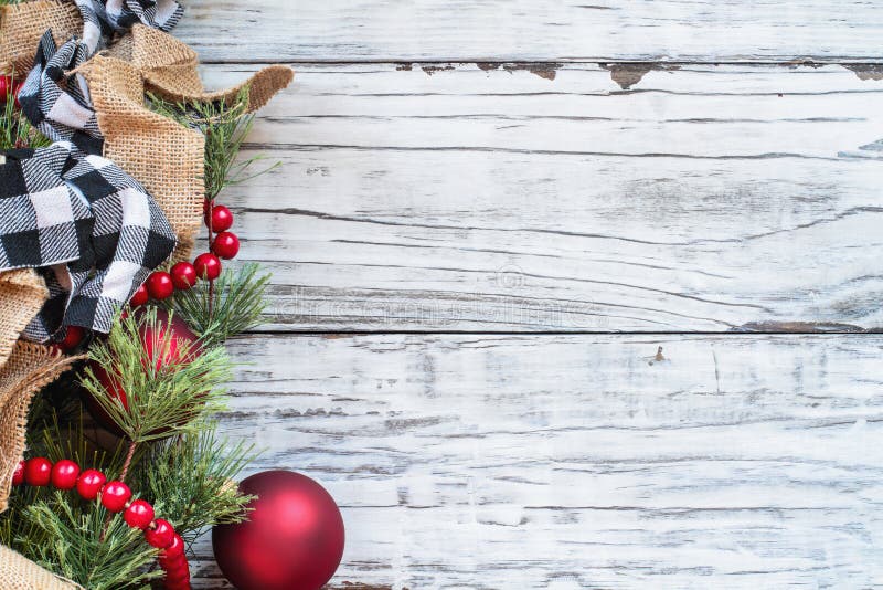 Christmas Trimmings against White Rustic Background