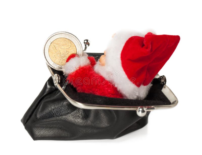 Old-fashioned empty purse from an imitation leather with Santa Claus and 2 Euro Coin. isolated on white background. Old-fashioned empty purse from an imitation leather with Santa Claus and 2 Euro Coin. isolated on white background