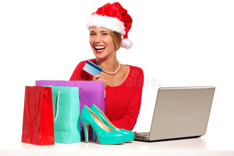 Christmas woman on laptop doing internet shopping