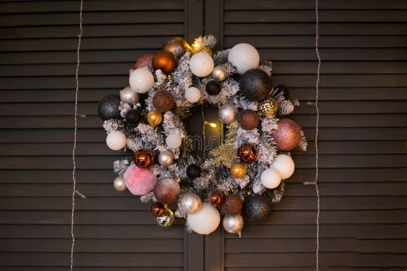Christmas wreath handmade with pink gift on wall gray loft royalty free stock photos Christmas wreath handmade with pink gift on wall gray loft royalty free stock photos