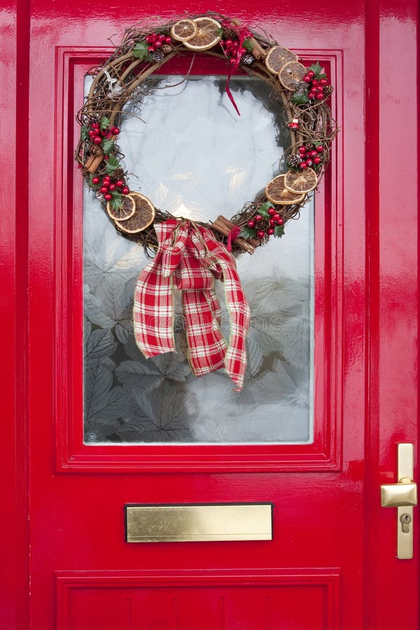 Christmas Wreath on a Red Door Stock Photo Image of plant, space