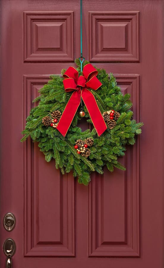 Christmas Wreath on a Red Door Stock Photo - Image of plant, space ...