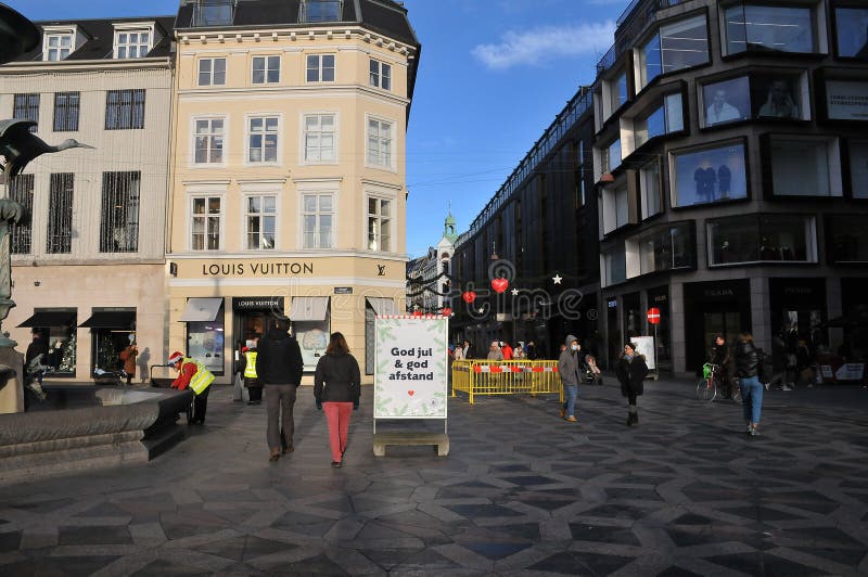 Copenhagen /Denmark/18 March 2023/ Louis Vuittons store and shopper with louis  Vuittons bag on stroeget in danish capital.. (Photo.Francis Joseph  Dean/Dean Pictures Stock Photo - Alamy
