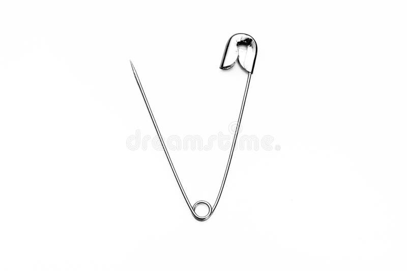 Chrome Metal Safety Pins On White Background Essential Equipment In Any