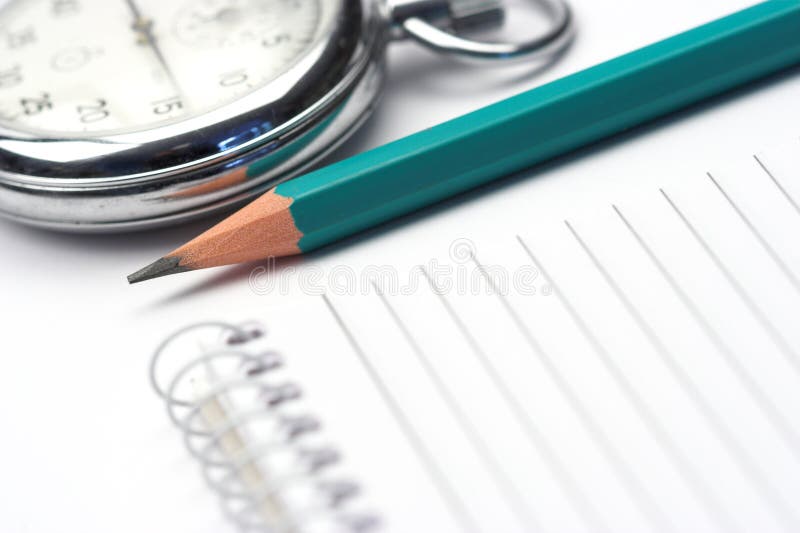 Długopis, chronometr i notatnik obraz stock