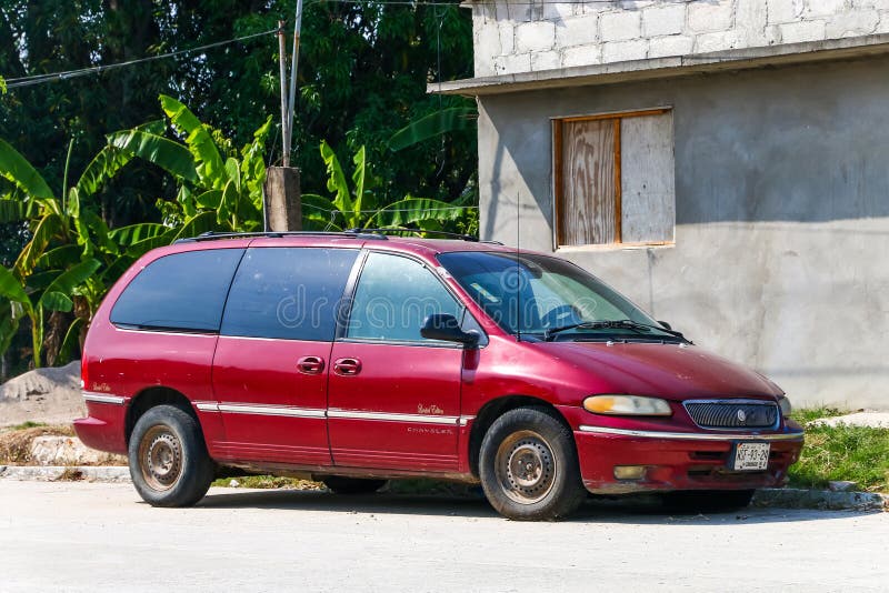 Palenque, Mexico - May 23, 2017: Old van Chrysler Voyager in the city street.