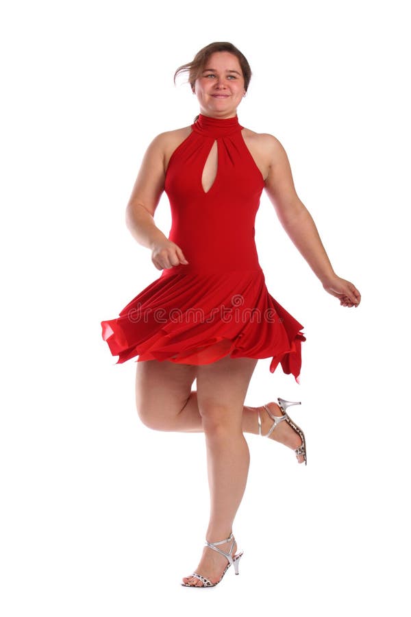 Chubby girl in red dress dancing