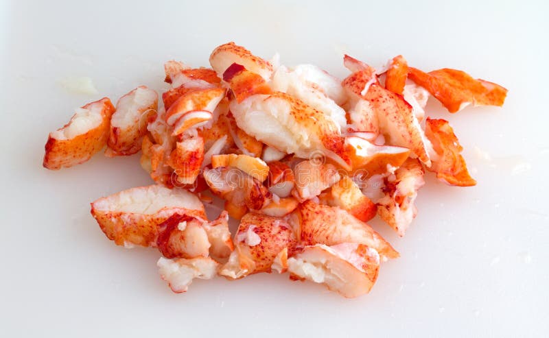 Chunks of lobster meat on cutting board royalty free stock photos Chunks of lobster meat on cutting board royalty free stock photos