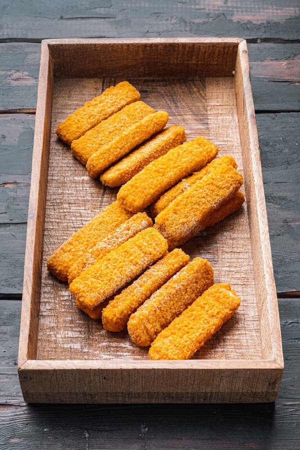 Chunky Breaded Frozen Fish Fingers, in Wooden Box, on Old Dark Wooden Table  Background Stock Image - Image of crumbed, fillet: 235089239