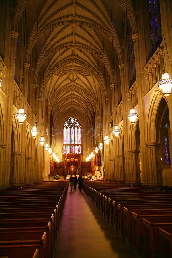 Inside of a large, modern church.