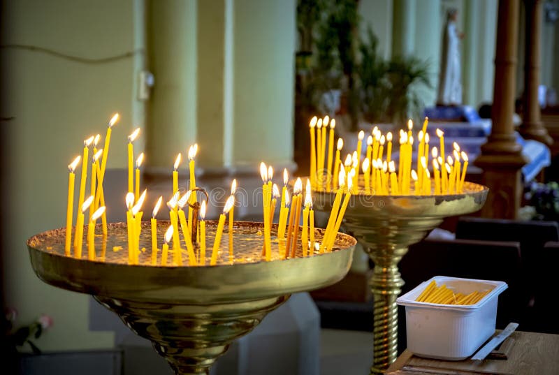 Candles Burn in the Darkness in the Church Stock Image Image of