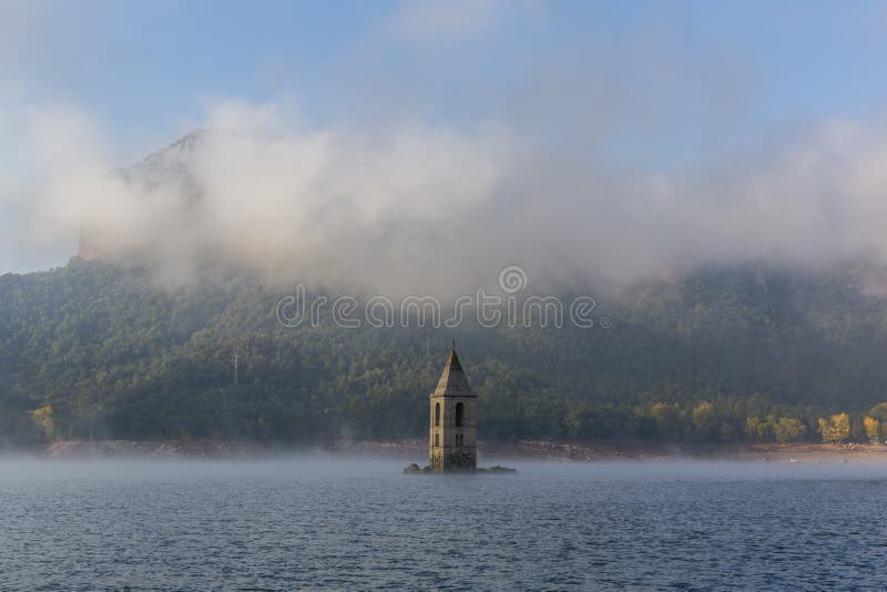The Church of Sant Roma is a submerged church located on the Sau reservoir, Catalonia, Spain. The Church of Sant Roma is a submerged church located on the Sau royalty free stock photography The Church of Sant Roma is a submerged church located on the Sau reservoir, Catalonia, Spain. The Church of Sant Roma is a submerged church located on the Sau royalty free stock photography