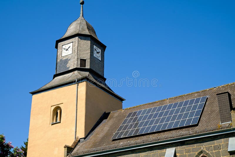 Church with solar panels royalty free stock photography