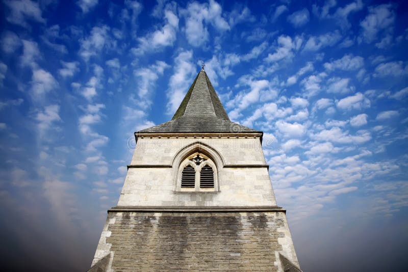Church spire against a dramatic sky