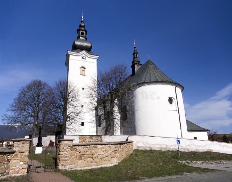 Church of St. George in Bobrovec, Slovakia. Vertical springtime view of Roman-Catholic church of St. George in Bobrovec village, which is one of the oldest stock photos Church of St. George in Bobrovec, Slovakia. Vertical springtime view of Roman-Catholic church of St. George in Bobrovec village, which is one of the oldest stock photos