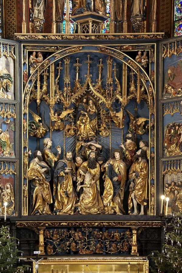 Church of St Mary - Krakow - Poland. The High Altar by Veit Stoss (Dates from 1478) in the Church of St Mary in the Main Square (Rynek Glowny) in the city of stock photography Church of St Mary - Krakow - Poland. The High Altar by Veit Stoss (Dates from 1478) in the Church of St Mary in the Main Square (Rynek Glowny) in the city of stock photography