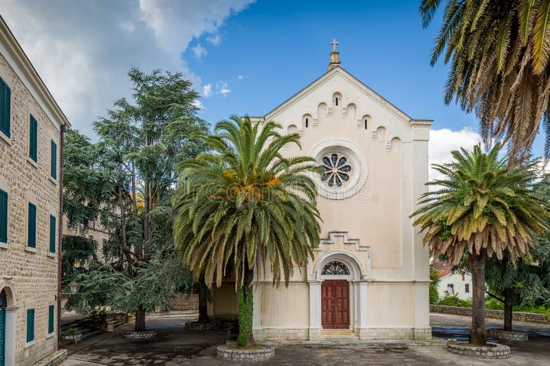 Church and stone old house calm view with palms