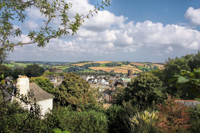 Church in Totnes against countryside in England