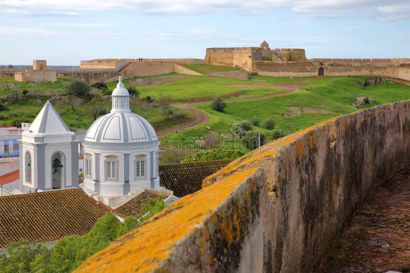 The church and the village of Castro Marim viewed from the castle and with Sao Sebastiao fort in the background, Castro Marim, Alg