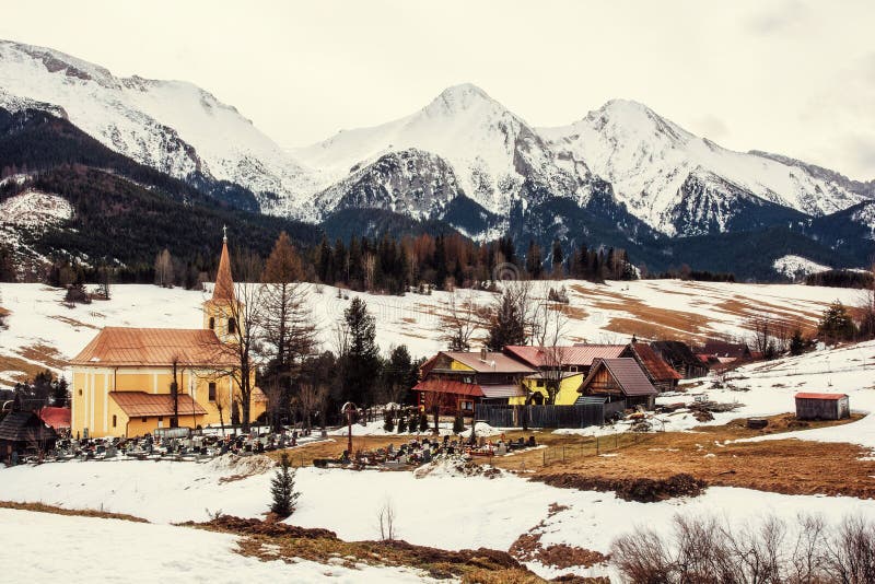 Church in Zdiar village with Belianske Tatry mountains, Slovakia