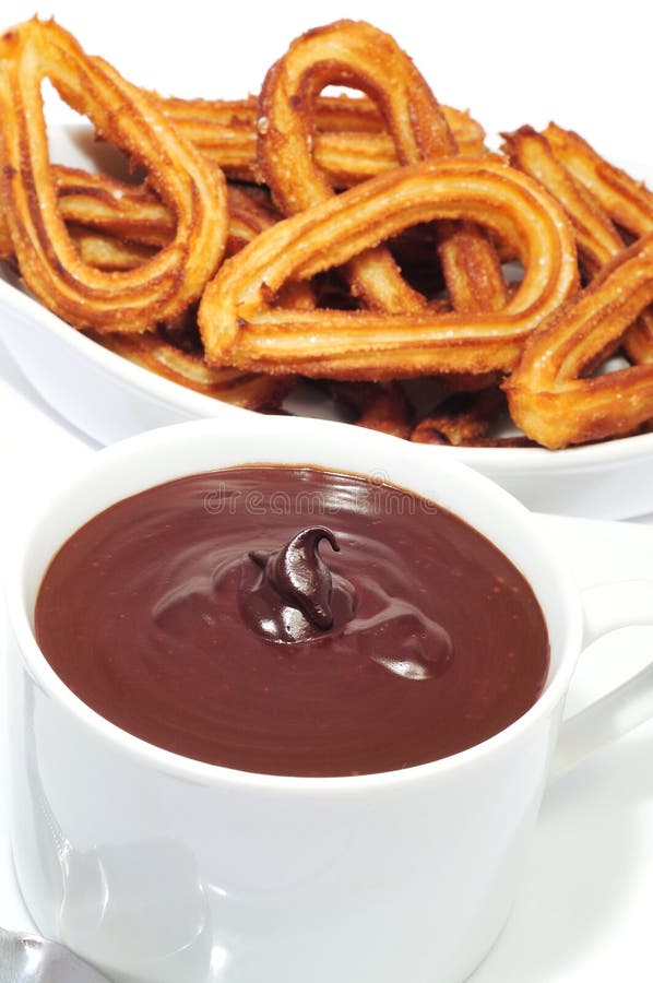 Churros with chocolate royalty free stock photos