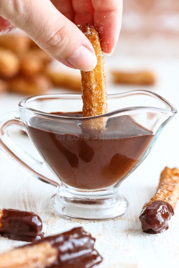 Churros with Chocolate royalty free stock image