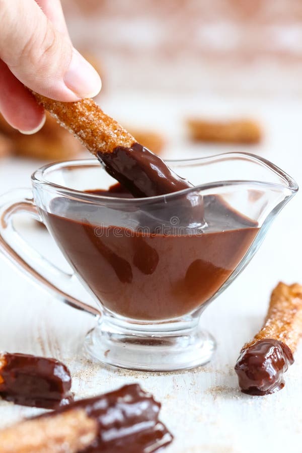 Churros with Chocolate royalty free stock photos